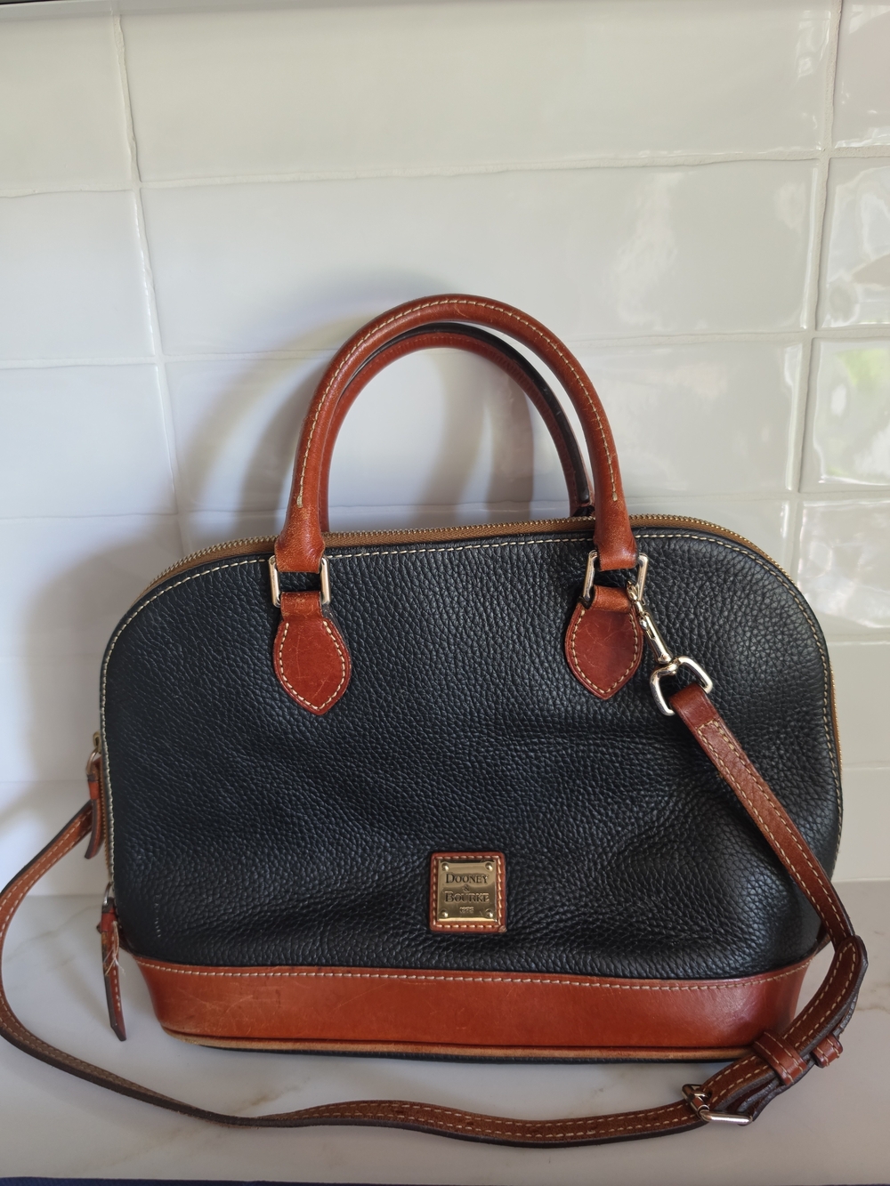 Dooney & Bourke Black Pebbled Leather Satchel with Brown Trim